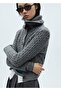 Cardigan with Knitted Patterns in the Lice