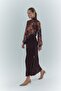 تنورة طويلة بطيات وسحاب جانبي