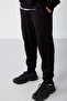 Jeremiah Men's Regular Leg Stretchy Fabric Black Sweatpants with Lanyard Waist and Elastic Pockets - 2