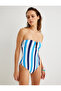 Strapless Swimsuit with Window Detail and Geometric Accessories