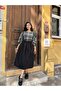 بلوزة سوداء منقوشة بأكمام بالون - 2