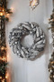 Door, table, wall decor and candlestick