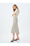 Polka dot patterned midi length flared viscose skirt. - 2