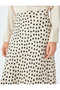 Polka dot patterned midi length flared viscose skirt. - 5