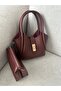 Women's Burgundy Mini Bag with Lock Detail and Strap for Hand and Shoulder Use - 2