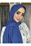شال مطوي باللون النيلي - 4