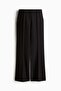 Flared slit-hem twill trousers