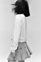 Pleated denim skirt