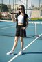 Energetic Style: Zip-Up Hoodie Jacket, Suspender Crop and Interlaced Shorts