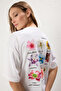 Beyaz %100 Kalın Pamuklu Oversize/Geniş Kalıp Ön Arka Çiçek Baskılı Örme T-Shirt TWOSS25TS00099