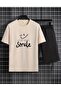 طقم قصير مطبوع عليه SmileSummer باللون الأسود والبيج - قالب مريح
