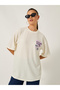 Textured Oversized T-Shirtâ€‹ with Printed Patchwork Detail