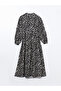 فستان منقوش بياقة القاضي الأسود - 6