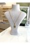 Zircon Stone and Green Baguette Stone Detailed Dorika Chain Medallion Gold Yellow Gold Color Serenay Necklace