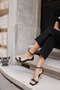 Clauss Women's Black Patent Leather Single Strap Ankle Tie Heel Sandals - 5