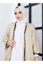 قبعة مسطحة مزينة بالشرّابات - كريمي - SAHRA BUTIQUE - 2