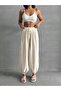 Women's Beige Pocket Muslin Fabric Shalwar Trousers