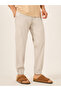 Solid Relaxed Fit Elasticated Cuffed Joggers with Contrast Drawstring