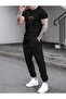 تي شيرت Take It Easy Sweatpants Jogger - تي شيرت من القطن الممشط مطبوع باللون الأسود