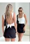 بلوزة ذات رقبة مربعة وقصة منخفضة من الخلف (ليست محاصيل)