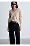 Pointed collar oversize sweater
