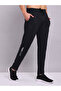 Men Black Solid 4-Way Stretch Track Pants - 4