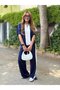 طقم نسائي من القماش المشروط مع ياقة وشريط بسحاب ومفصل - 3