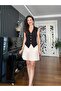 Stone Pleated Mini Skirt
