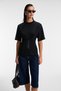 Naria Women's Crew Neck Short Sleeve Agraj Detail at Waist Relaxed Fit Black Blouse