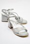 Woman's glittery high heel shoe silver glitter