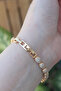 Vip series gold color drop model bracelet with rice zircon stone - tj-bb6077 - 2