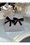 Black Ribbon Form Gold Detailed Earrings