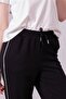 Women's mid-length pocketed pants - black - 4