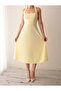 Square neck midi dress with buttons from the neck