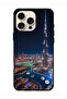 غطاء حماية لجهاز Apple iPhone 16 Pro Max بمنظر ليلي لوسط المدينة
