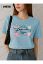 The Impossible Happens Printed Cotton Fabric Girl Light Blue T-Shirt