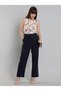 Women White Floral Print Sleeveless Top with Pin Tuck Detail
