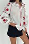 Women's White Cotton Blouse with Ethnic Pattern, Floral Embroidery, and Tasseled Details