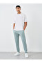 بنطال رياضي رجالي رمادي اللون بقصّة Slim Fit وحاشية مفتوحة - 2