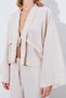 Beige Comfortable and Stylish Women's Shirt with Lace Detail and Draped Fabric. |   Ek100175052 ​​English - 4