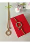 مجموعة قلادة وسوار مثبتة على ربع