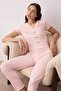 Pembe Yaka ve Baby Overlok Detaylı Çiçek Aksesuarlı Fitilli Örme Pijama Takımı THMAW26PT00068 - 2