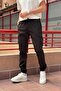 Black Men's Oversize Jogger Trousers with Elastic Waist and Legs and Cargo Pockets