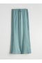 Quality Pieces from Çelebi Store: Girls' Trousers with Belt and Scallop Detail