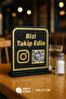 لافتة ذهبية سوداء برمز QR مكتوب عليها 'تابعونا' مقاس 15×18 سم من البليكسي - مع أيقونة إنستغرام
