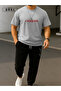 Conquer the World Printed Oversize Gray T-Shirt & Black Pants Tracksuit Set