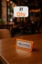 Silver Silver Gray Metal Lettering on Orange Plexiglass from the Tabletop Lettering Series - 100 mm X 50 mm
