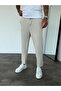 Cream Asymmetric Leg Boyfriend Pants