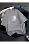 تيشيرت مطبوع للجنسين مطبوع عليه Titan مقاس كبير