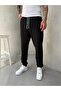 Black Leg Rubber Tracksuit